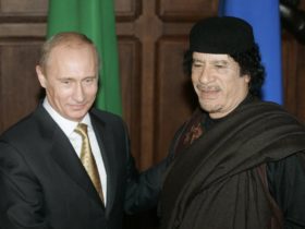 بوتين والقذافي